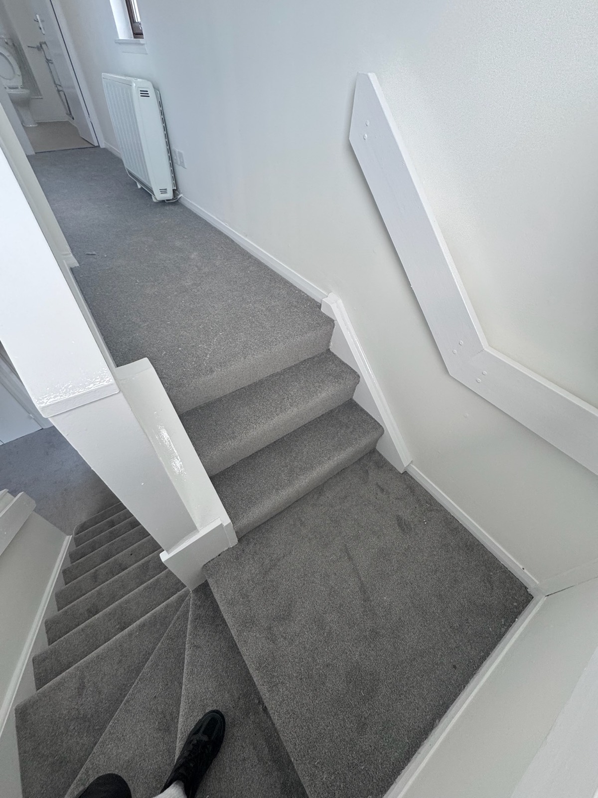 Staircase after carpet installation