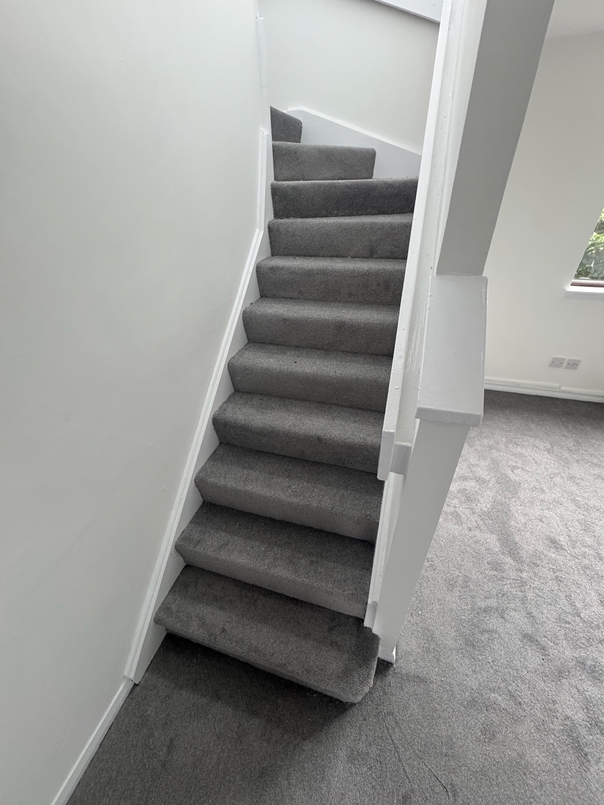 Staircase after carpet installation, second project